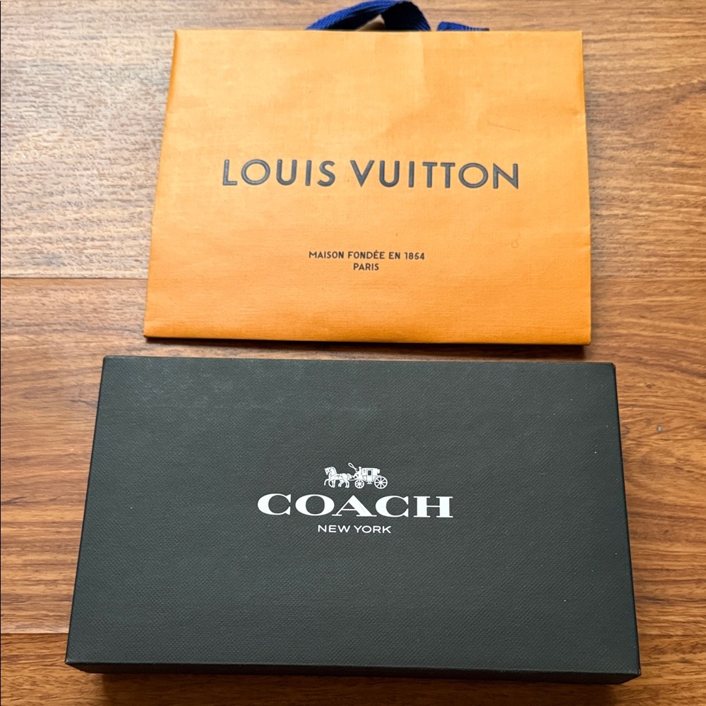 Louis Vuitton Orange Bag and a coach gift box